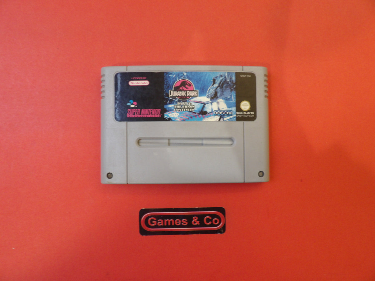 Jurassic Park Super Nintendo cartridge displayed on a red background with logo.