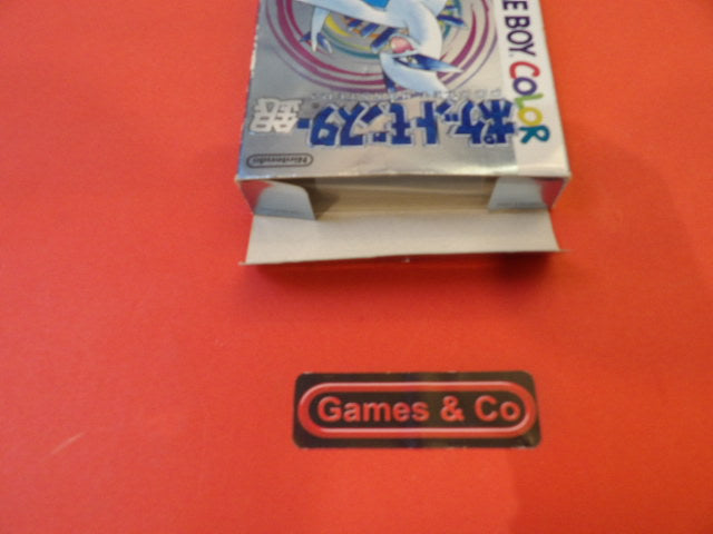 Pokemon Game Boy Color boxed game cartridge on a red background