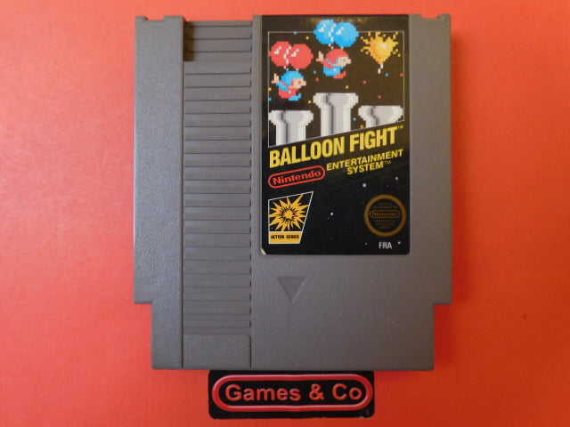 Nintendo NES Balloon Fight cartridge on display with colorful label and retro design