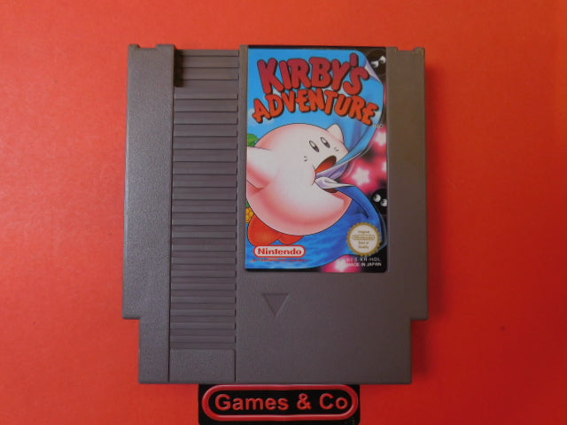 Kirby's Adventure NES cartridge displayed on a vibrant orange background, featuring Kirby on the label.