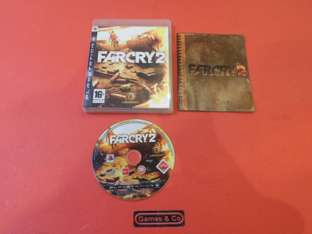 Far Cry 2 Playstation 3 disc with cover and manual displayed on an orange background.
