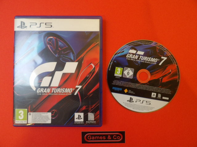 Gran Turismo 7 PS5 disc displayed with case on a red background, showcasing the game cover design.