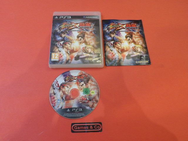 Street Fighter X Tekken PS3 disc and case displayed on an orange background for PlayStation 3.