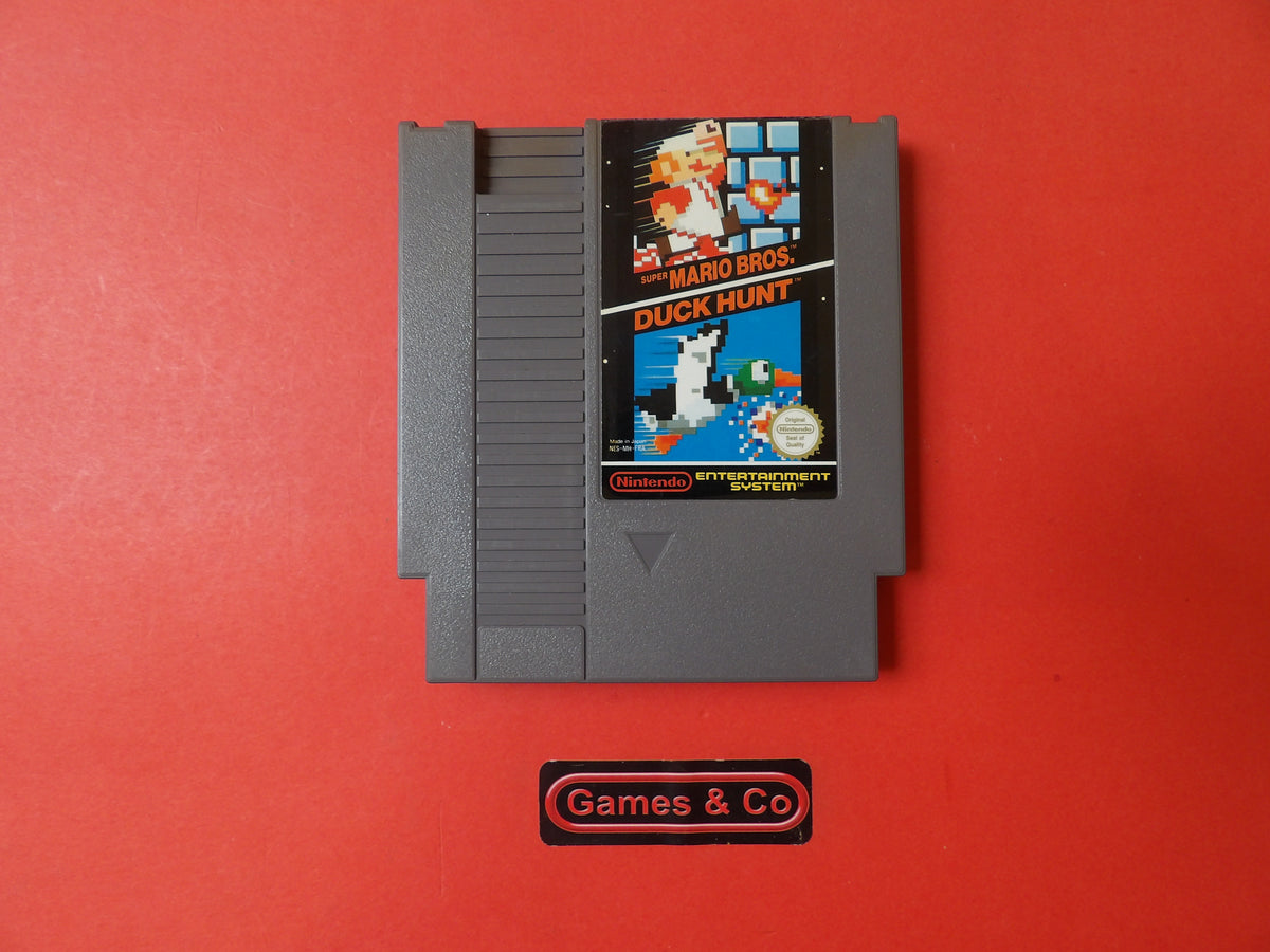 Nintendo Super Mario Bros Duck Hunt cartridge on a red background, showcasing the classic video game design.