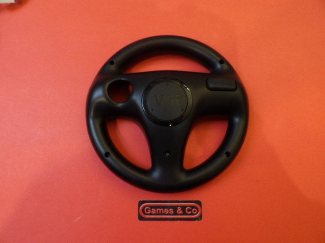 Nintendo Wii steering wheel on a red background, designed for enhanced gaming experience.
