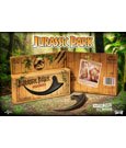 Jurassic Park Replica 1/1 Raptor Claw displayed with packaging and promotional photo in a jungle background.